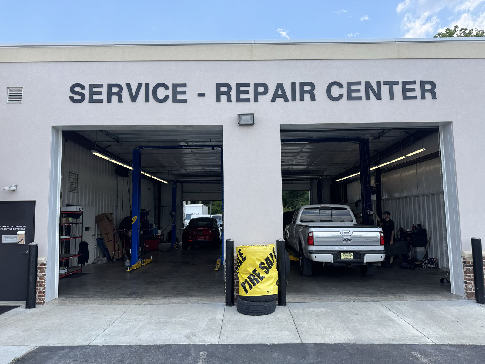 The Mitchell Mill Motors Service & Repair Center, the newer building on the same corner